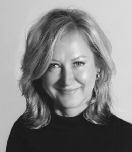 A professional headshot of Dorothy Kudla in black and white
